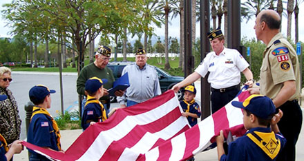 Boy Scouts fold the U.S. Flag