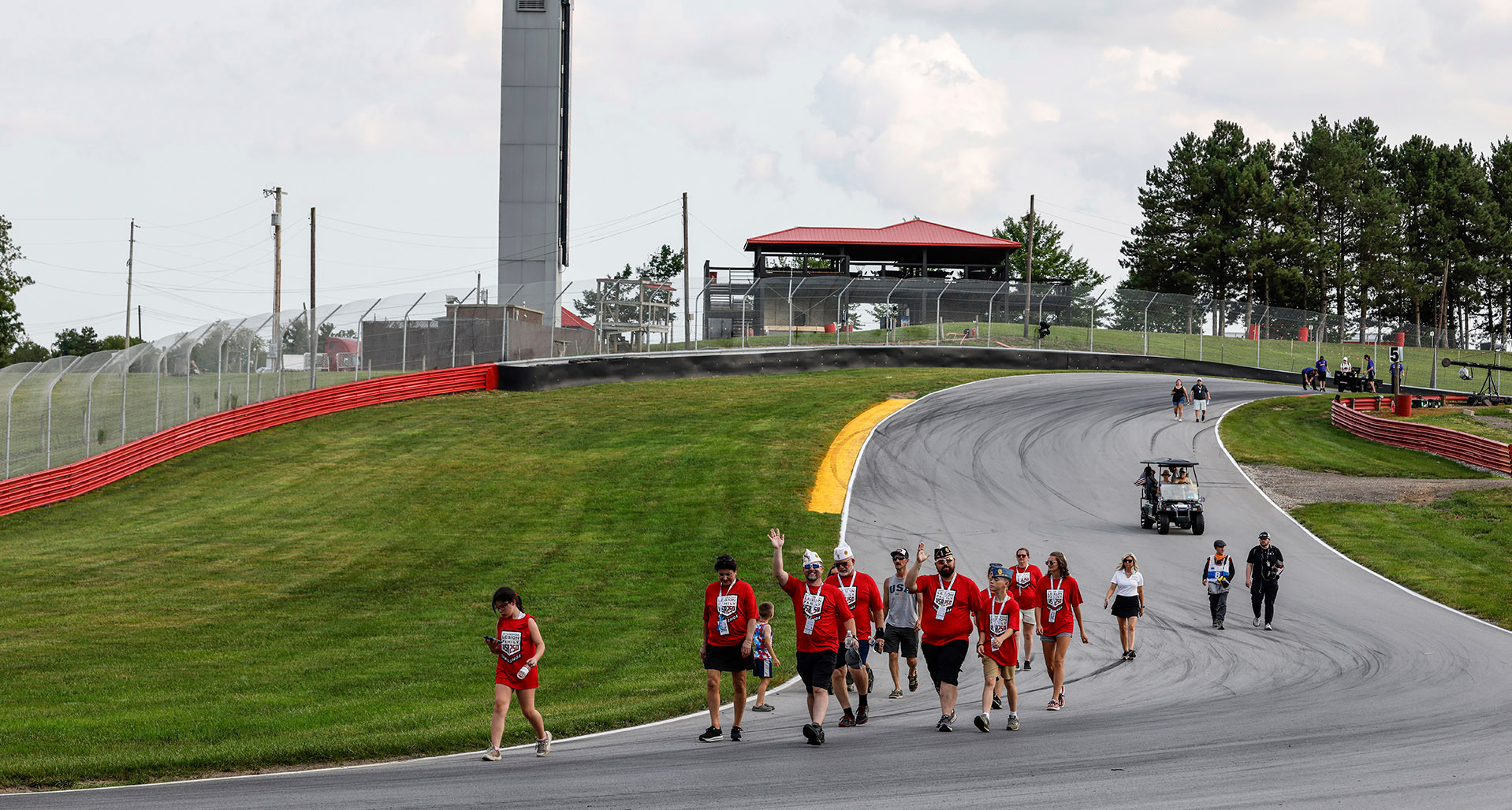 American Legion Ohio family members kick off the USA 250 Challenge during a track walk at the Mid-Ohio Sports Car Course on Thursday, July 3. Photo by Michael L. Levitt 