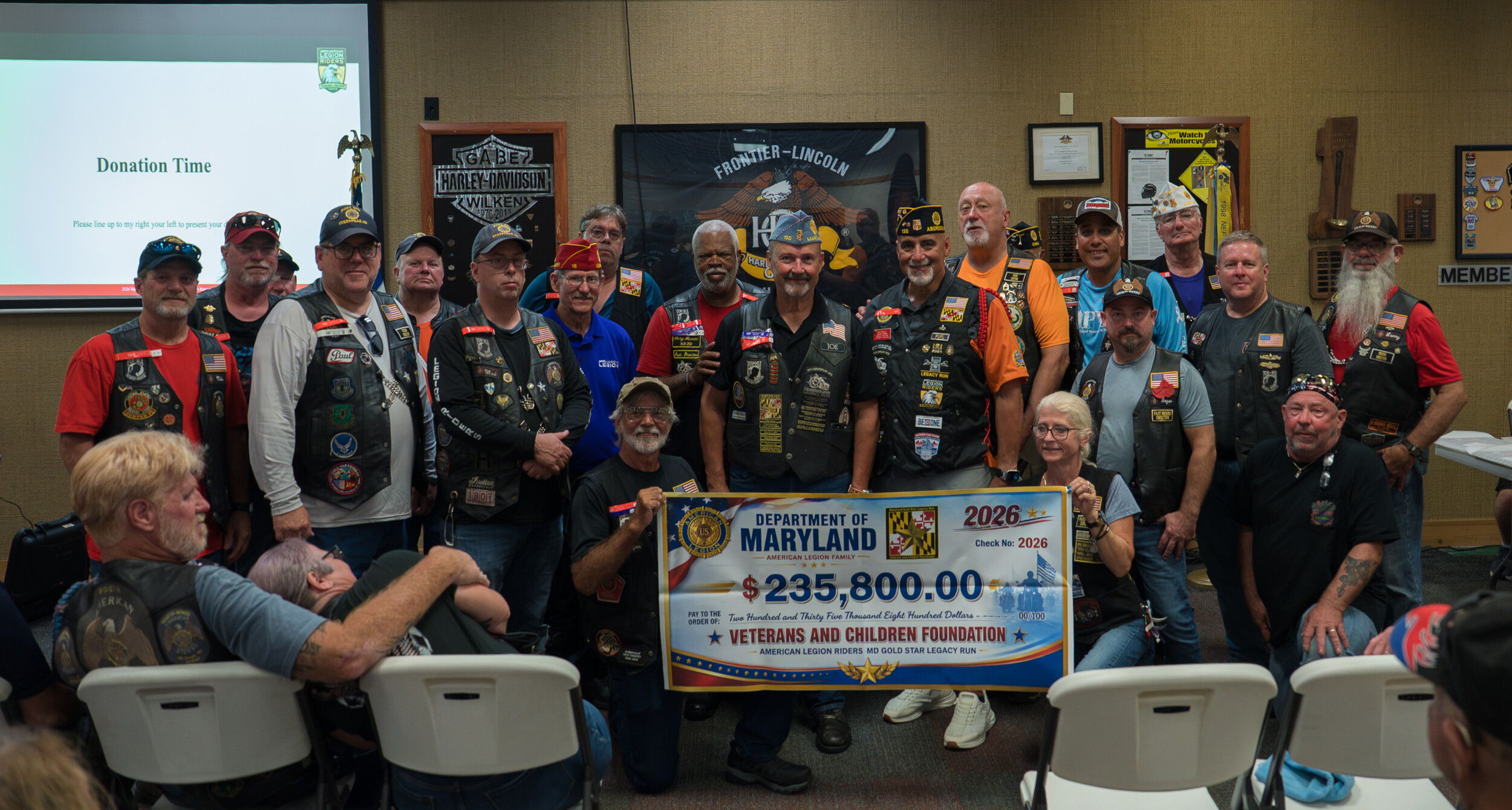 American Legion Riders from the Department of Maryland present their donation to the Veterans and Children Foundation. (Photo by Jennifer Blohm/The American Legion)