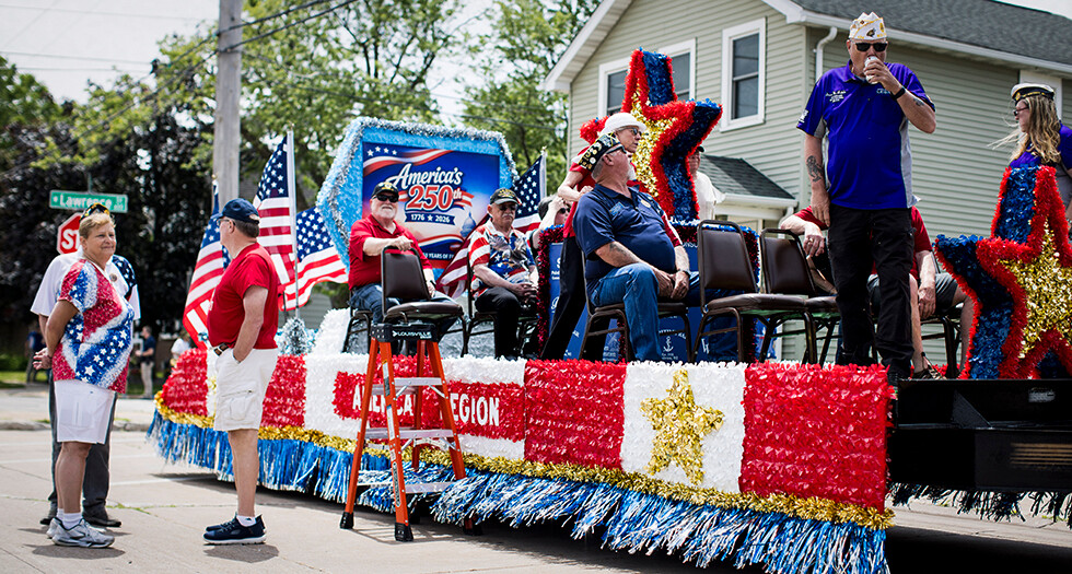 Members of the American Legion Family of Post 38 In Appleton, Wis., prepare to join the annual Appleton Flag Day Parade. Photo by Narayan Mahon&nbsp;