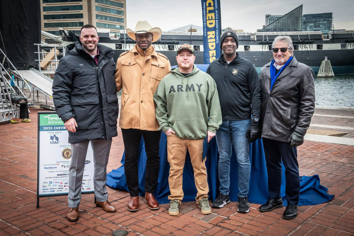 (L to R) Mark Steiding of Kenwood Auto Body, NFL legend Robert Griffin III, Army veteran Patrick Huber, USAA Senior VP Rob Braggs and Dale Moss of NABC Recycled Rides®. Edwin Remsberg – AP
