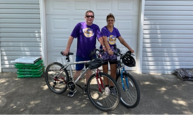 Empty nesters reconnect through biking 100 miles a month