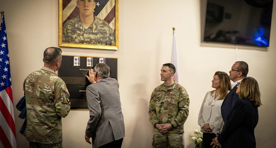 Robert Ollis, father of U.S. Army Staff Sgt. Michael Ollis, in the dining facility at Camp Kosciuszko in Poznan, Poland, that’s named after Michael. (Karen Sampson/U.S. Army)