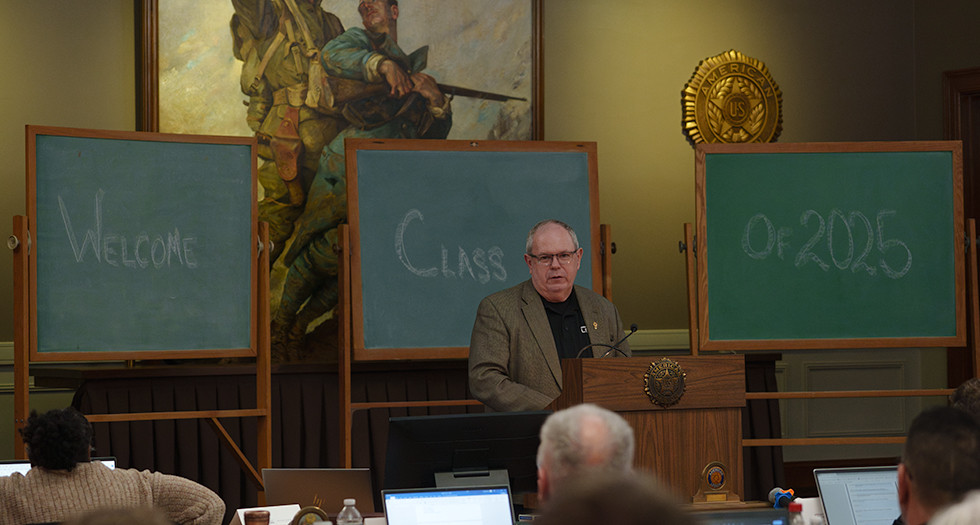 Mike Rohan, dean of National American Legion College, addresses the class of 2025 at National Headquarters in Indianapolis. Jennifer Blohm/The American Legion