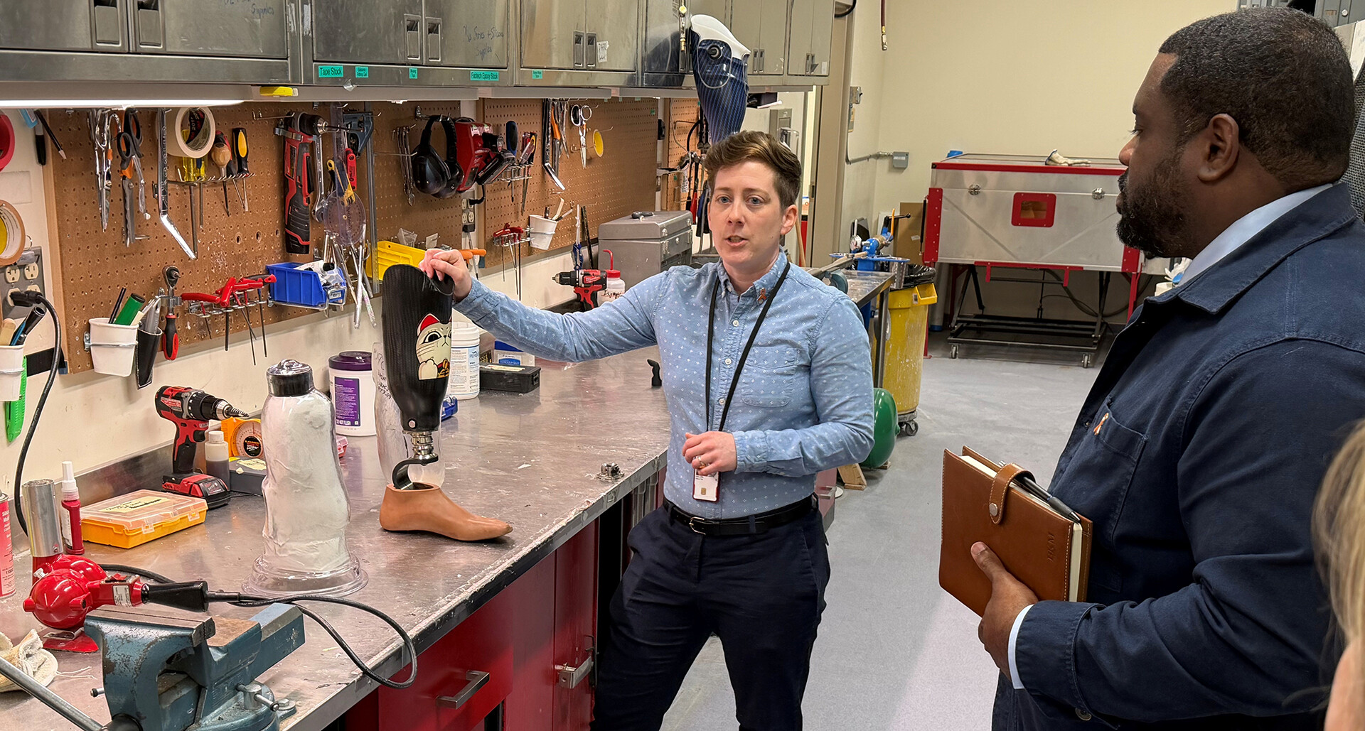 VA Puget Sound Health Care System Prosthetics Lab Chief Kelly Walling briefs the Legion’s System Worth Saving group. (Photo by Steven B. Brooks)