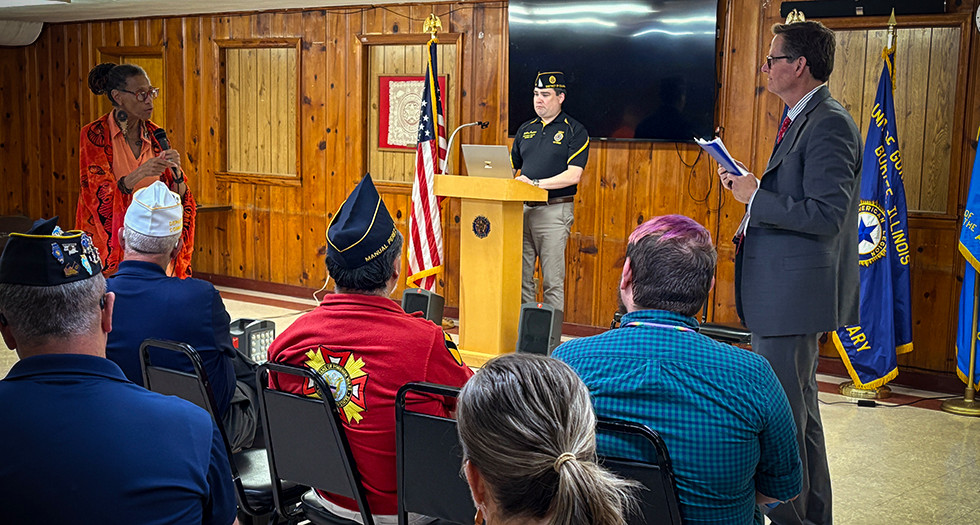 Air Force veteran Genevieve Petruzzelli, a member of American Legion Post 771 in Illinois, shares her VA experiences during a System Worth Saving town hall on Aug. 4. (Photo by Henry Howard)