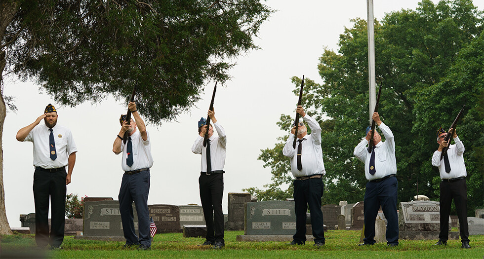 Post 351’s honor guard performing a Memorial Day graveside service at a cemetery in Elberfeld, Ind. (Jennifer Blohm/The American Legion)