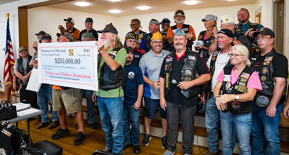 Department of Maryland Legion Riders present their donations at Post 8 before the 2025 Legacy Run. Photo by Jennifer Blohm/The American Legion