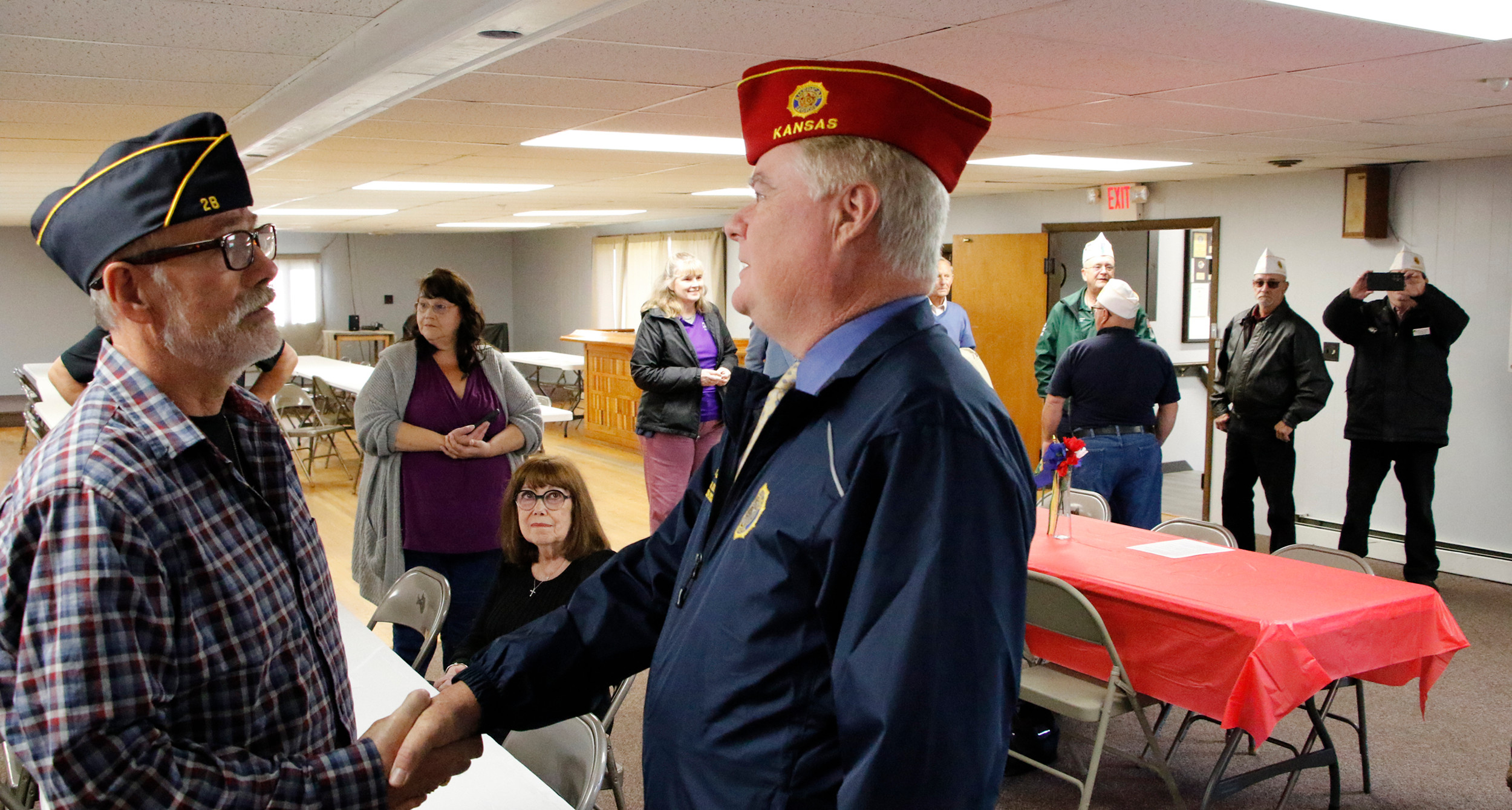 Commander Wiley visits with members of Jay Peak Post 28 in North Troy, Vt.