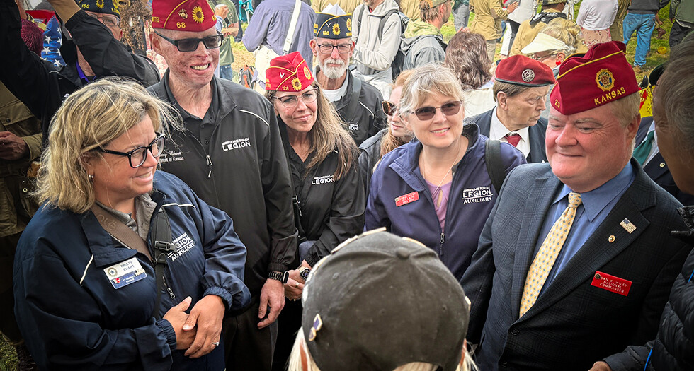 Commander Wiley and fellow Legion Family members met the WWII veterans who attended the annual parachute drop at La Fiere Bridge. Photos by Jeff Stoffer