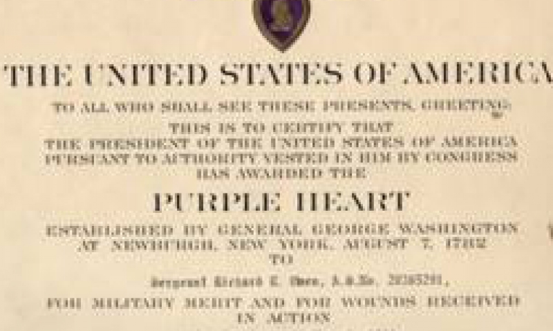 Owens' Purple Heart citation going home