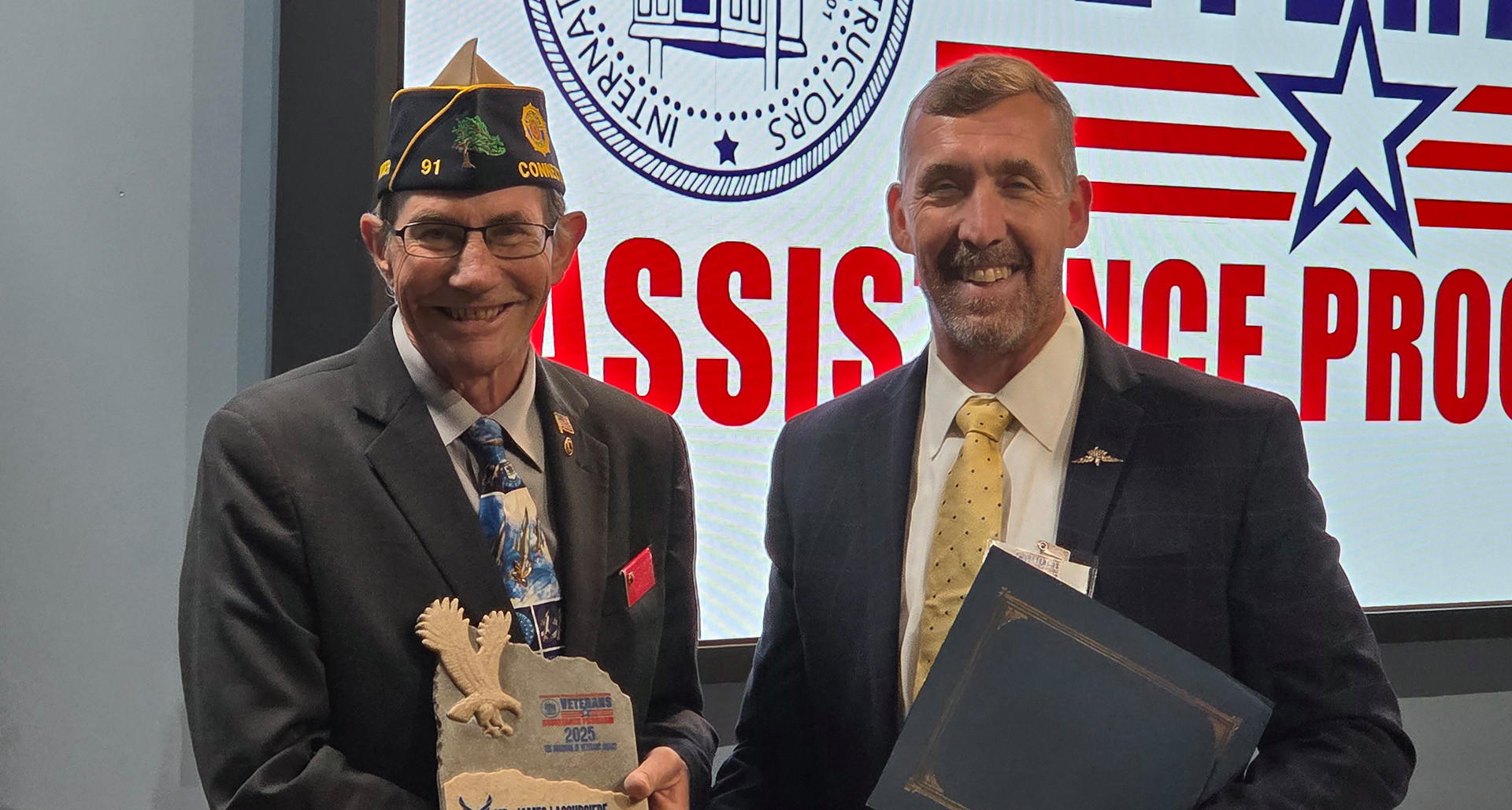 Past National Commander James LaCoursiere Jr. (left) with IUEC-VAP National Chairman Jason Gray. (Photo by Laura Edwards)