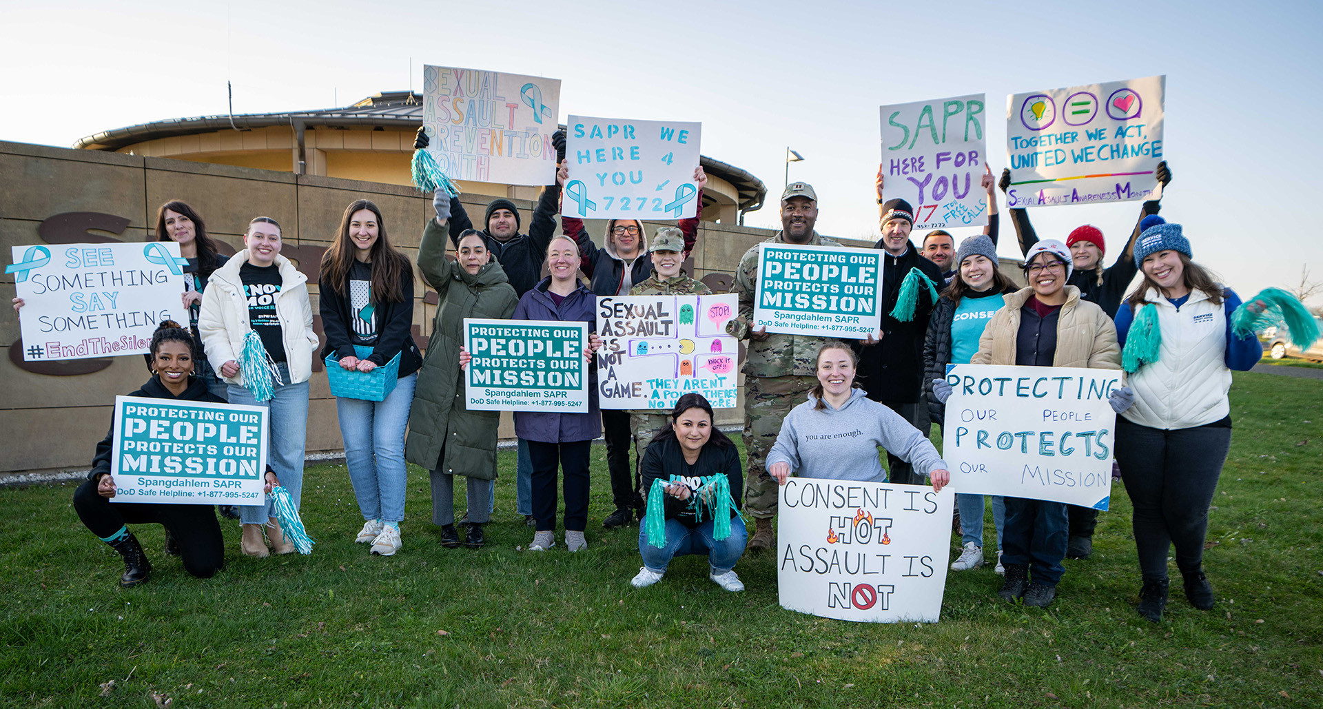 Volunteers pose for a photo during the first day of Sexual Assault Awareness and Prevention Month at Spangdahlem Air Base, Germany, April 1, 2025. (U.S. Air Force photo by Senior Airman Albert Morel)