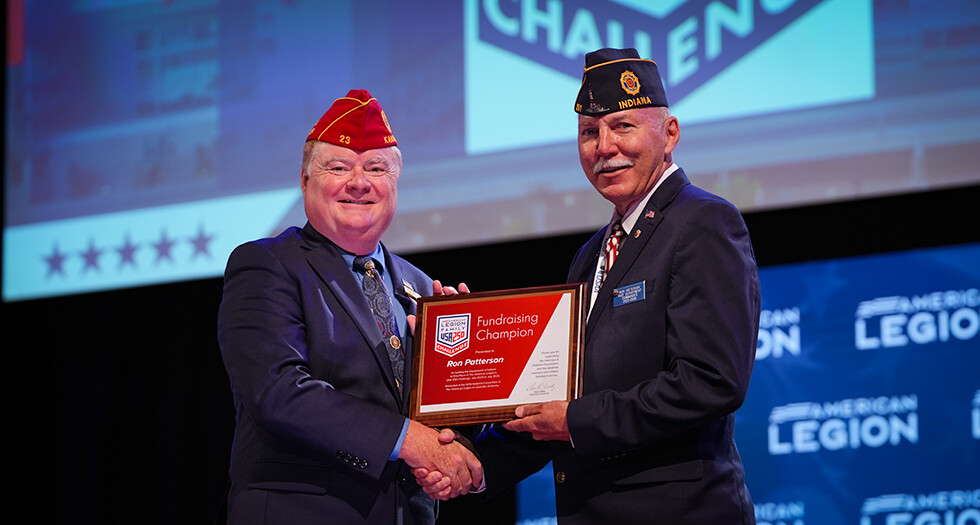National Commander Dan K. Wiley presents a USA 250 Challenge Department Fundraising Champion award to Indiana Past Department Commander Ron Patterson. Photo by Jennifer Blohm