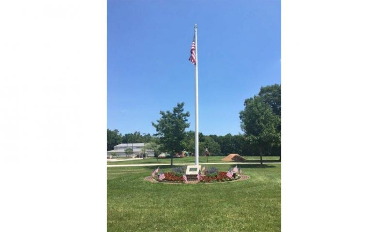 U.S. flag still waves from 1923 wood flagpole