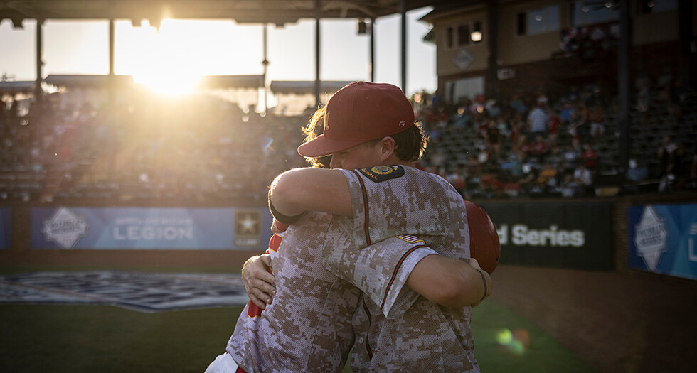 Cayden Nieto of Midland, Mich., Berryhill Post 165 and teammate Gabe Wegener embrace after their win in Game 11 of the 2026 American Legion World Series. Photo by Chet Strange