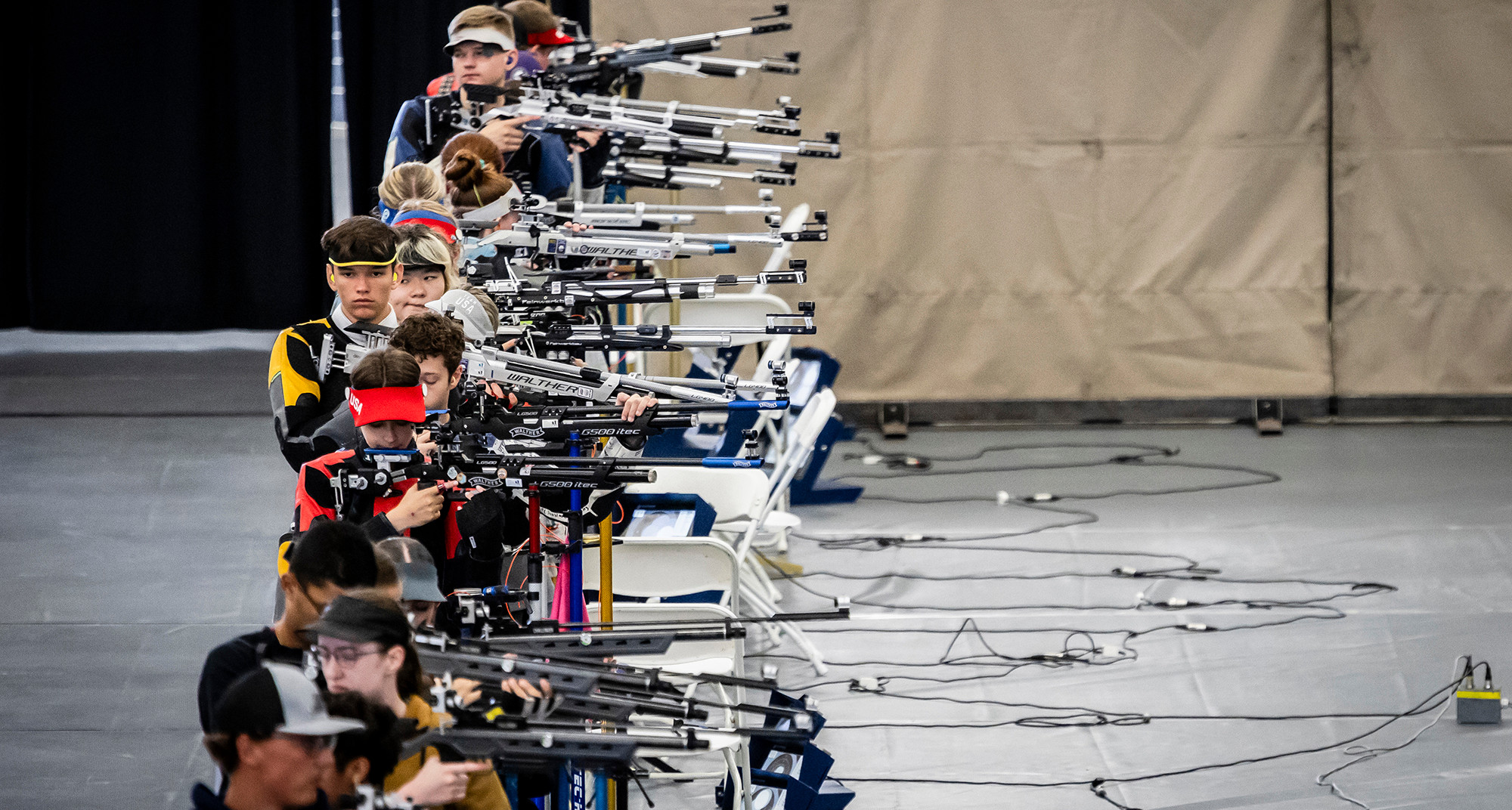 Competitors take aim at the American Legion Junior 3-Position Air Rifle National Championship at Hillsdale College. Photo by Chet Strange