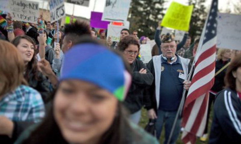 Legionnaires rally against anti-gay church