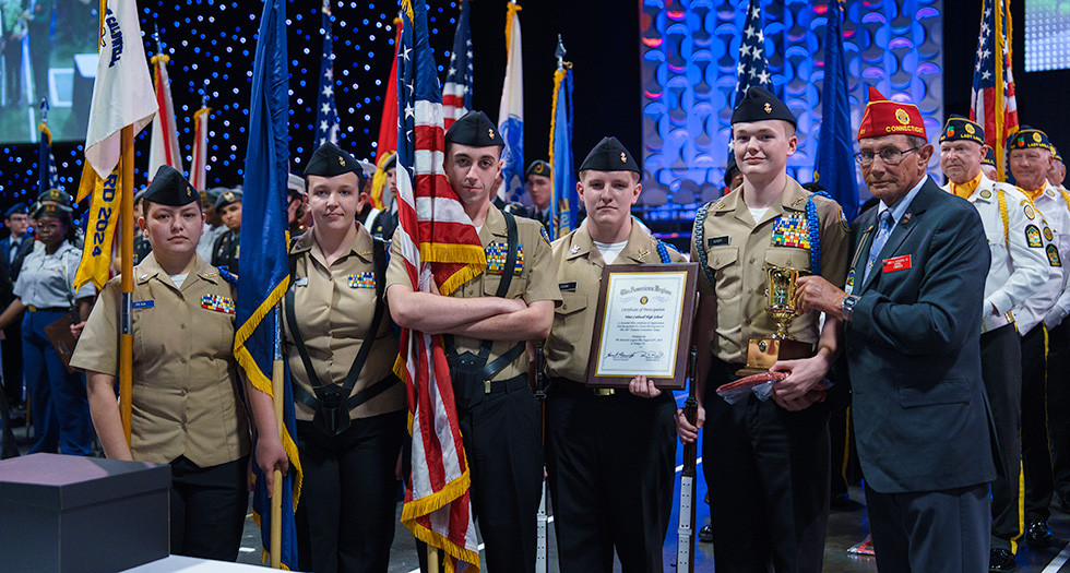 National Commander James LaCoursiere Jr. awards West Caldwell High School at the Color Guard competition. Photo by Jennifer Blohm/The American Legion