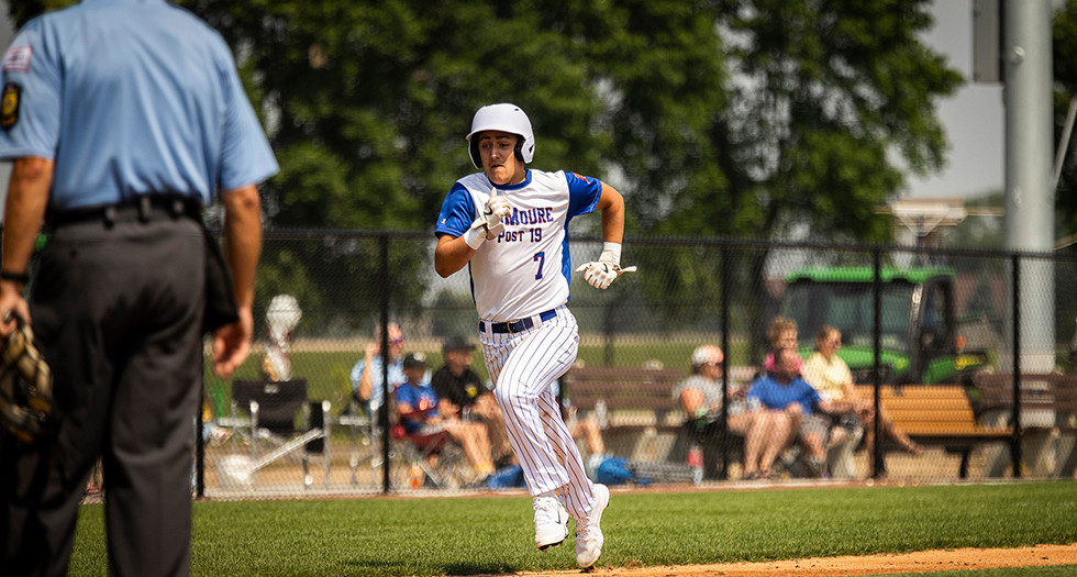 Blase Isaacson of LaMoure Post 19 runs to home during Game 3 of The American Legion Baseball Centennial Classic in Milbank, S.D. Photo by Chet Strange