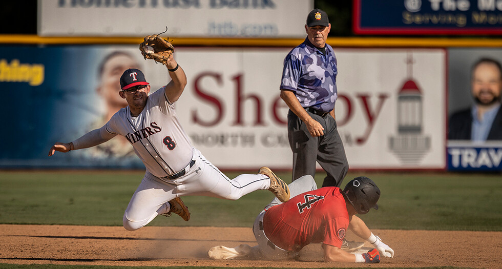 Cooper Goff of Tupelo, Miss. Post 49 makes a play on Nolan Foglio of Portland, Ore. Post 158 during Game 13 of the 2026 American Legion World Series. Photo by Chet Strange