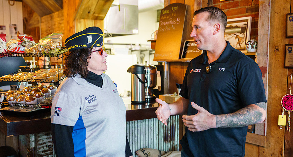 Legionnaire Gina Owens meets with Medal of Honor recipient Dakota Meyer in Princeton, Ind., Dec. 3. Photo by Jennifer Blohm/The American Legion