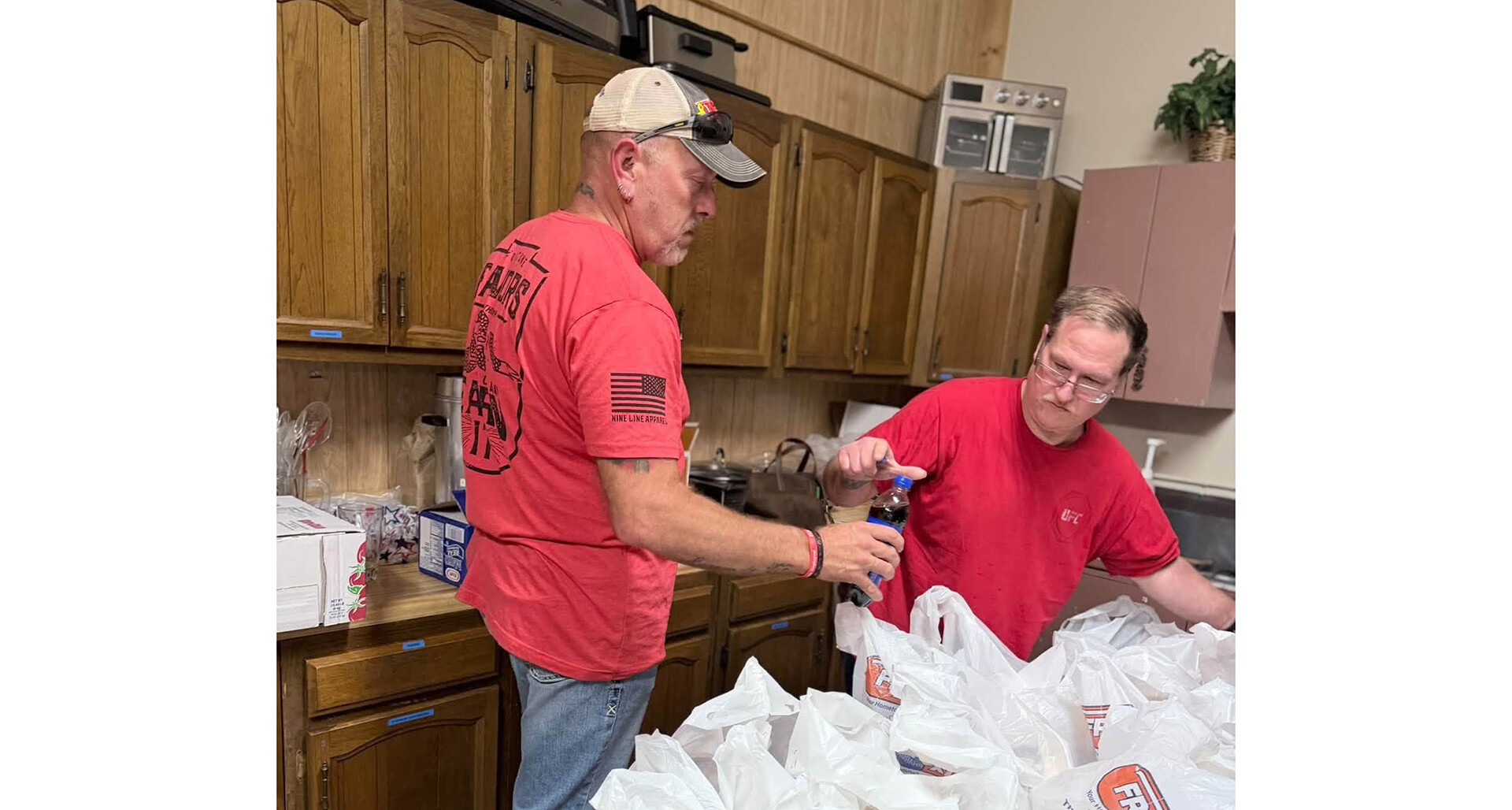 Members of Post 23 in West Virginia package food for those experiencing homelessness or food insecurity.