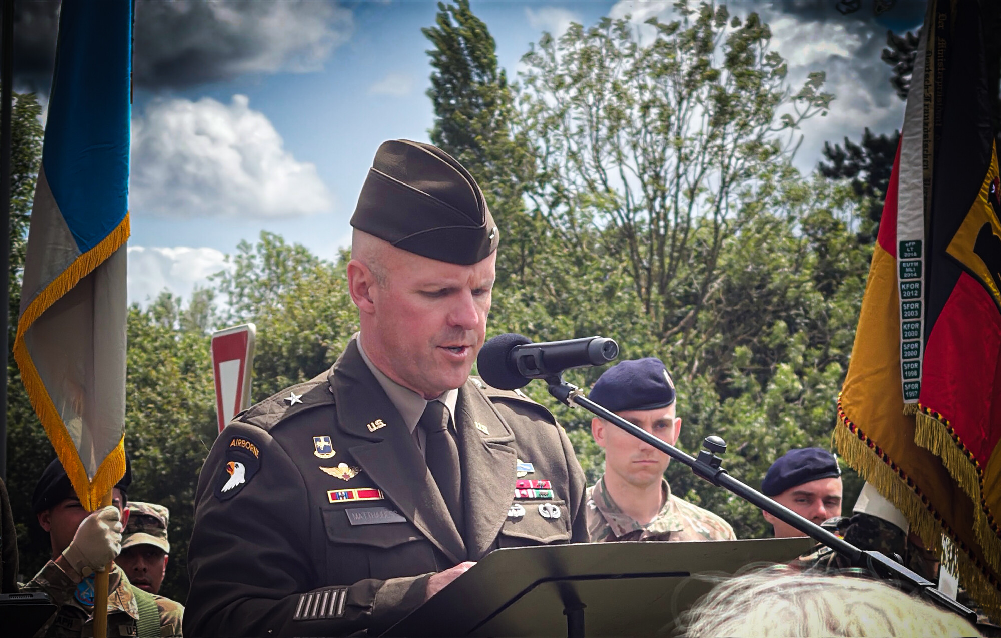 Brig. Gen. Matthaidess III speaks during a D-Day ceremony at the Statue of Liberation memorial in Ste. Mère-Église, Normandy, France. Photo by Jeff Stoffer.