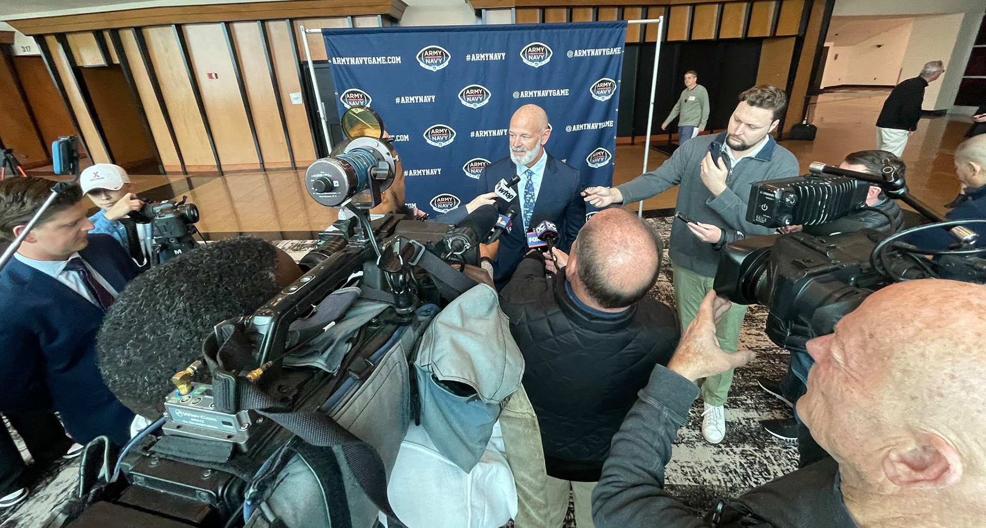 Navy Football coach Jeff Newberry answers questions during the Army-Navy Game media day event on Dec. 10 at Northwest Stadium in Landover, Md. (Navy Athletics photo)