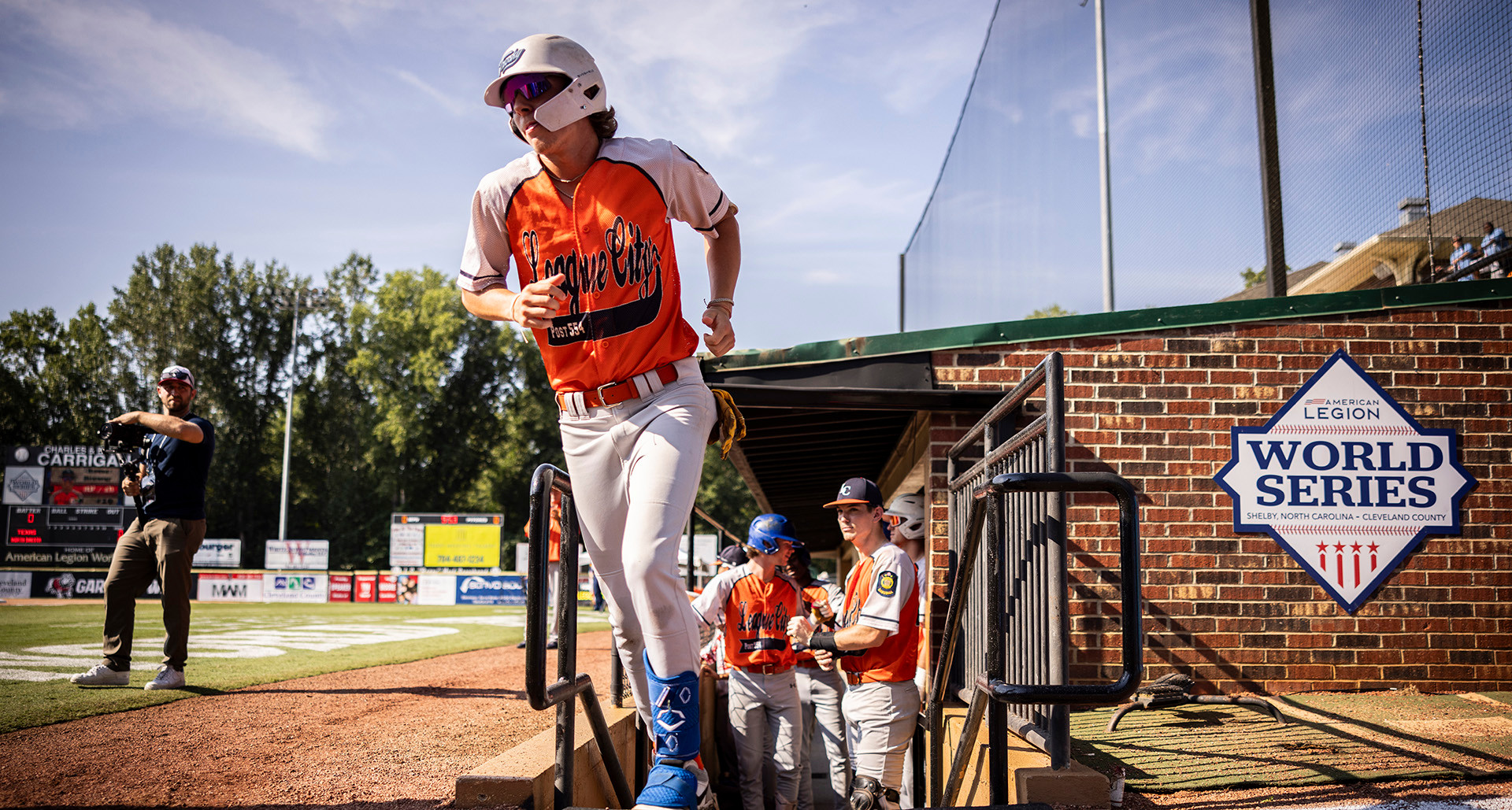 League City (Tex.) Post 554 players get ready in the dugout before Game 1 of the 2024 American Legion World Series. Photo by Chet Strange/The American Legion