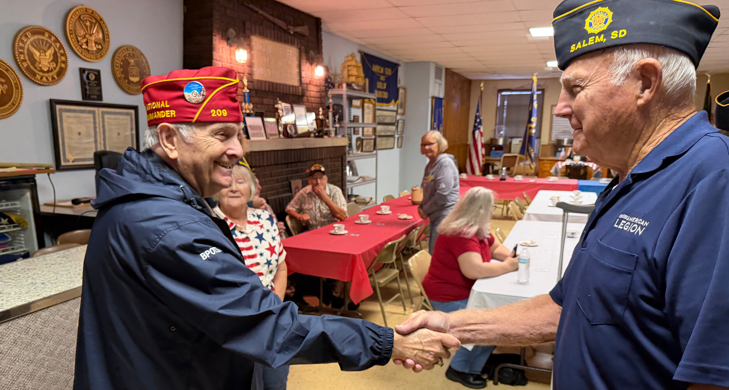 Commander Jay Bowen visits with members of Madison Post 25.