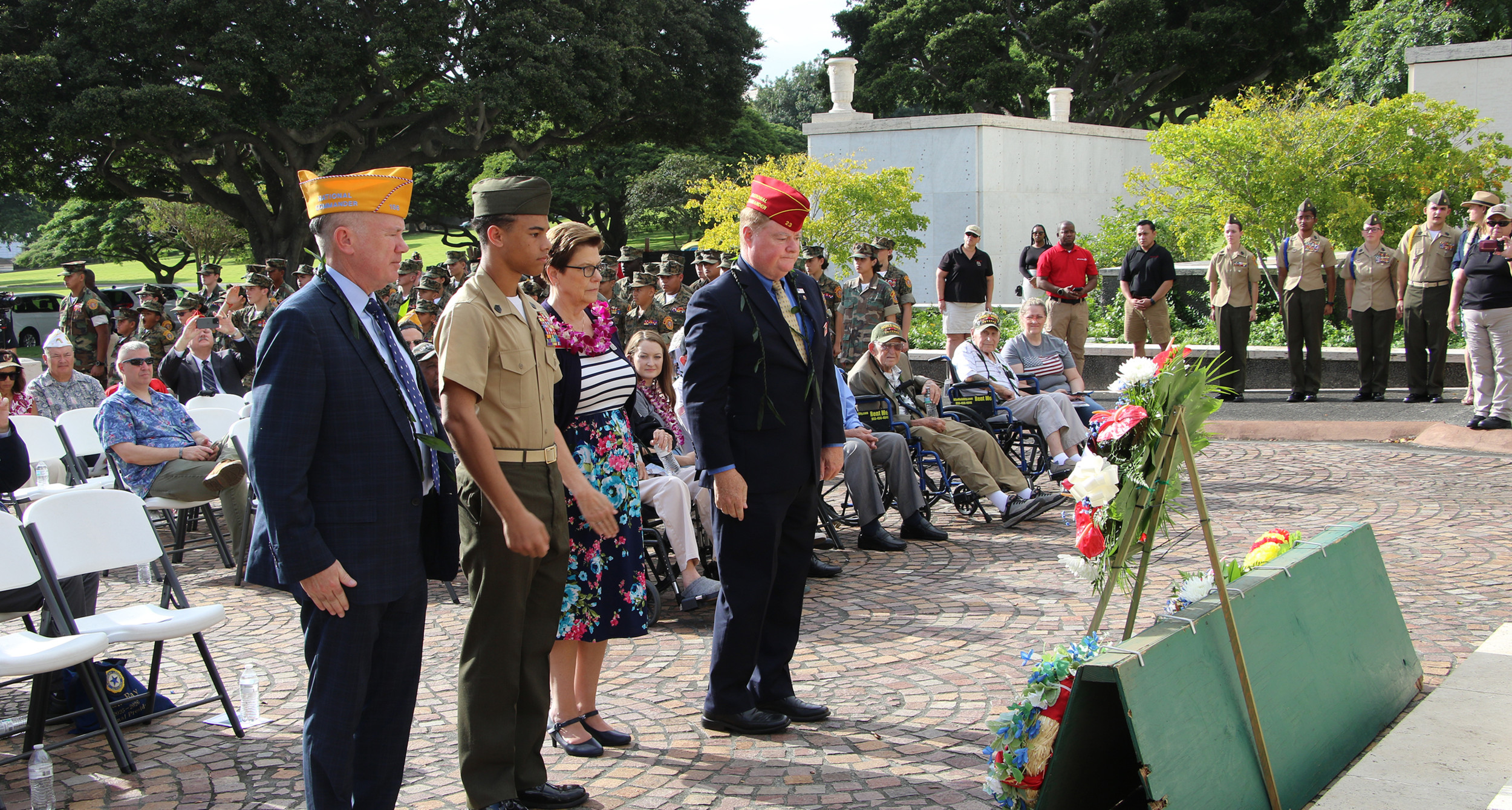 National Commander Dan K. Wiley, along with SAL National Commander Bill Clancy and Auxiliary President Pam Ray, lay a wreath during a Pearl Harbor ceremony.
