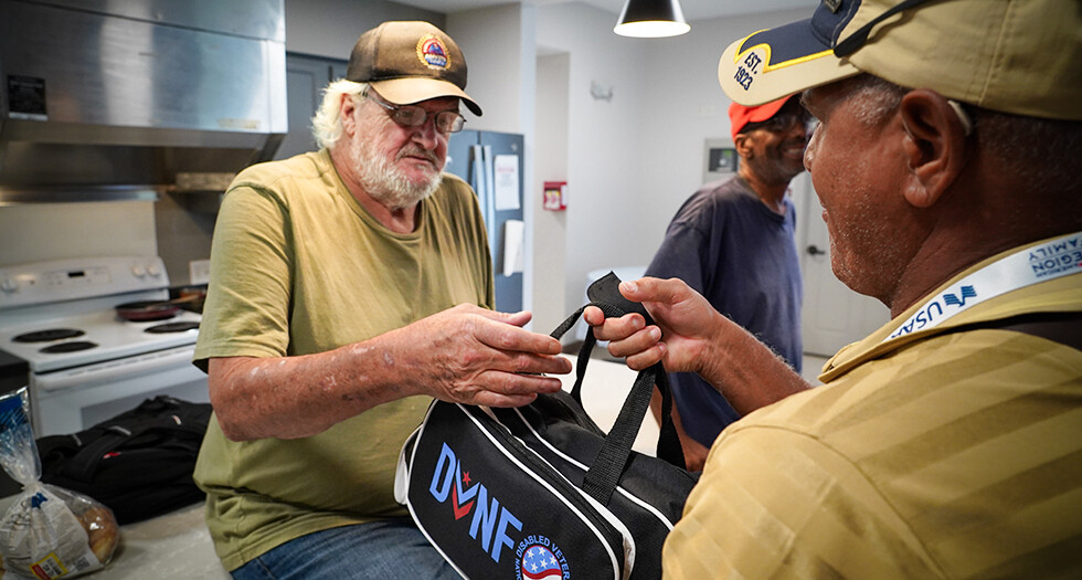 American Legion Family members visited a veterans transition housing center to deliver toiletry packages during the national convention. Photo by Jeric Wilhelmsen