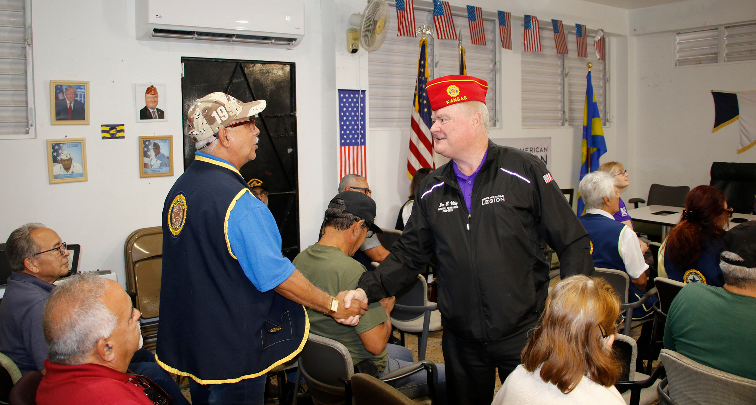 National Commander Dan Wiley greets members from Post 49 in Guanica.