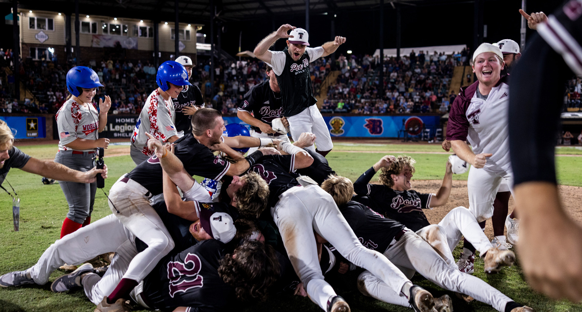 Troy (Ala.) Post 70 celebrates after winning the 2024 American Legion World Series at Veterans Field at Keeter Stadium in Shelby, N.C. Photo by Chet Strange/The American Legion