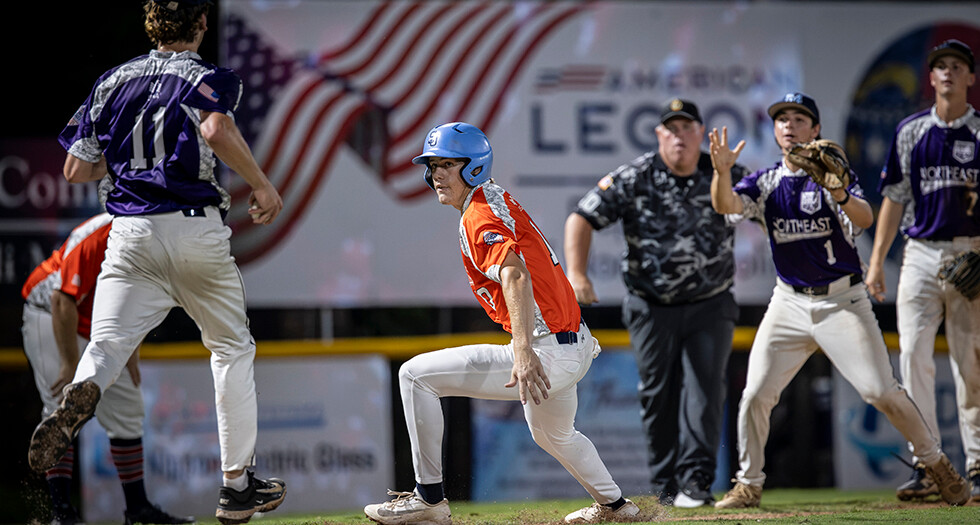 Kaeson Johns of Jacksonville, Fla., Post 316 gets caught in a pickle during Game 9 of the 2026 American Legion World Series. Photo by Chet Strange