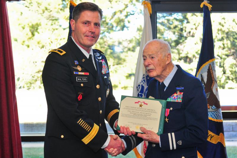 Colonel uses his retirement ceremony to honor World War II veteran