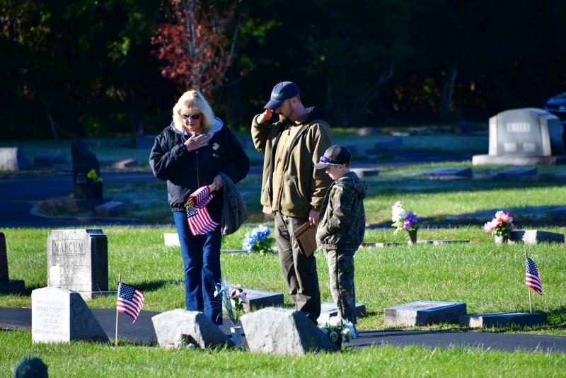 Northeast Post 630 places flags on veterans&#039; graves