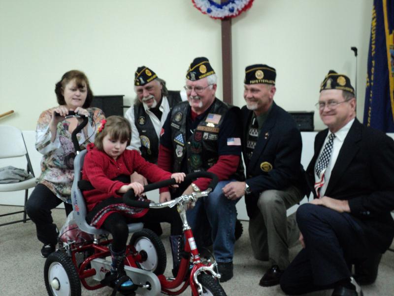Post 78 Riders help special child receive tryke