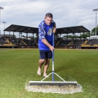 American Legion World Series Volunteer Grounds Crew member Gary Spangler, squeegees the outfield of Veterans Field at Keeter Stadium, Friday, August 11, 2017 in Shelby, N.C.. Photo by Matt Roth/The American Legion. 