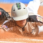 Alex Light of Lewiston, Idaho, Post 13 lands safely under a tag at first base during play against Hopewell, N.J., Post 339 during game 11 of The American Legion World Series on Sunday, August 13, 2017 in Shelby, N.C.. Photo by Lucas Carter/The American Legion. 