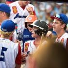 Tom Steier of Omaha, Neb., Post 1 is greeted in the dugout after scoring their first and only run against Henderson, Nev., Post 40 during the championship game of The American Legion World Series on Tuesday, August 15, 2017 in Shelby, N.C.. Henderson, Nev., beat Omaha, Neb., 2-1 becoming the 2017 ALWS Champions. Photo by Matt Roth/The American Legion.