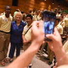 Jarred Walker, left, and Chann Austine Cortes, right take a photo with Holocaust survivor Nesse Godin after she spoke to the American Legion Boys Nation delegates on Thursday, July 27, 2017. Photo by Lucas Carter / The American Legion.