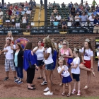 Little Miss American Legion World Series Queens stand on the sideline before Idaho faces off against Arkansas during game 3 of The American Legion World Series on Thursday, August 10, 2017 in Shelby, N.C.. Photo by Matt Roth/The American Legion. 