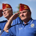 American Legion National Commander Charles Schmidt salutes as the parade passes the viewing booth in downtown Reno, Nev. on Sunday, August 20, 2017. Photo by Clay Lomneth / The American Legion. 