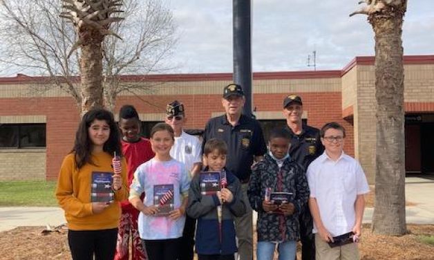 American Legion Post 166 honor guard teaches flag respect to school kids