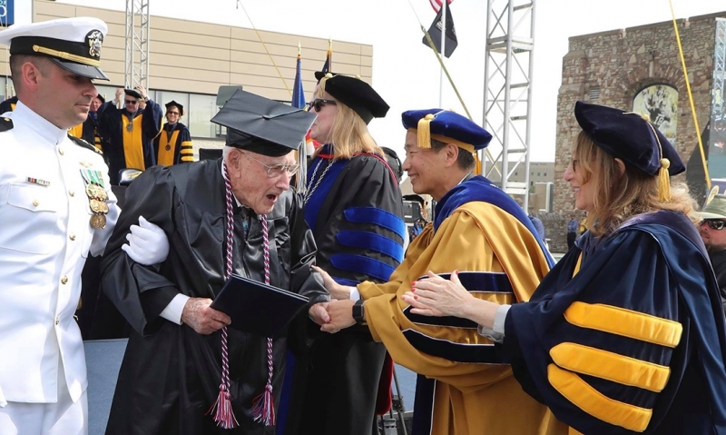 Legionnaire receives college diploma 68 years later